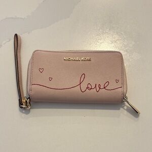 Valentine’s day date 
Michael Kors Love Script Pink Wristlet